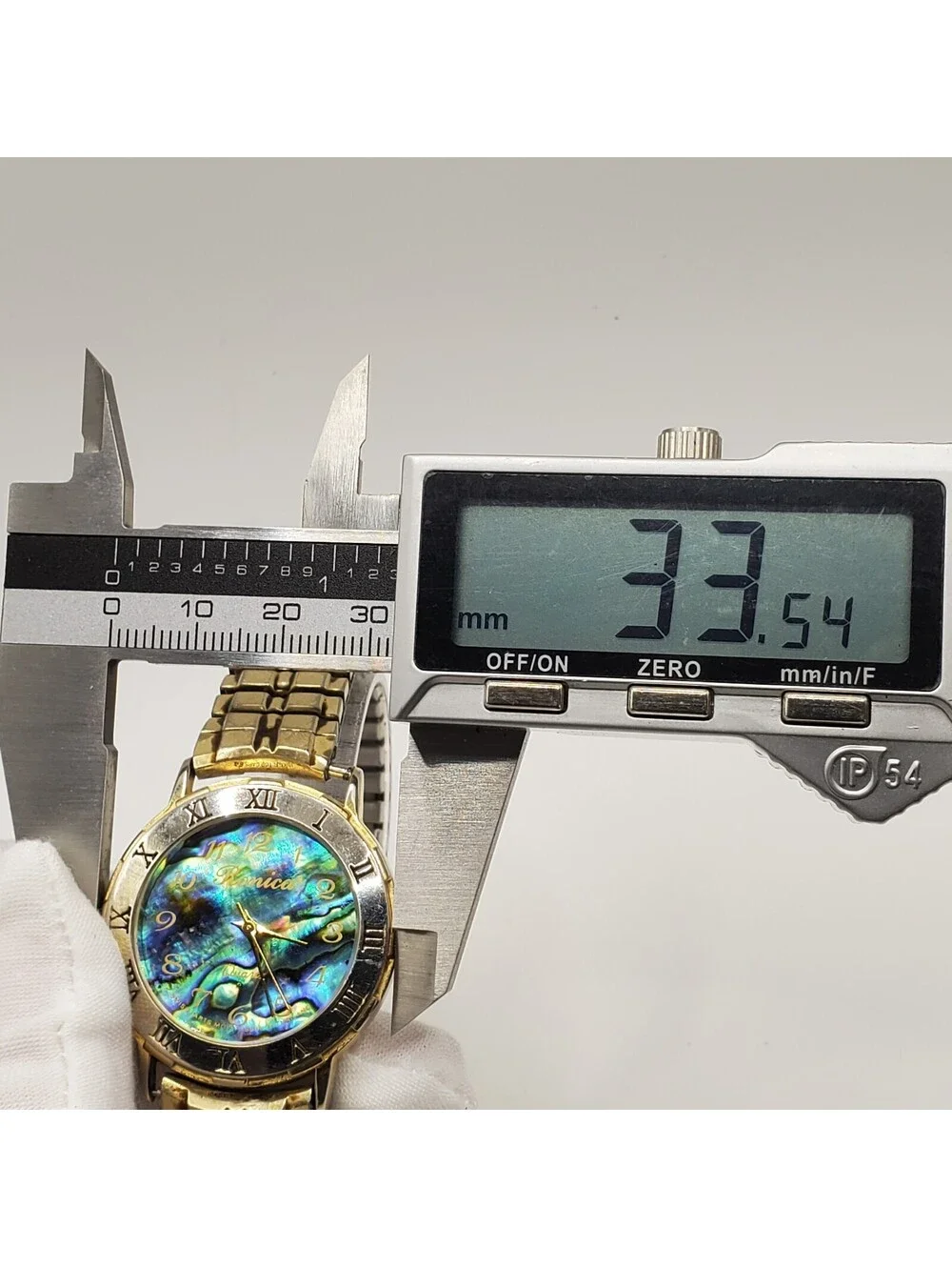 Ronica Watch Women 33mm Abalone MOP Dial Gold Tone Stretch Band New Battery